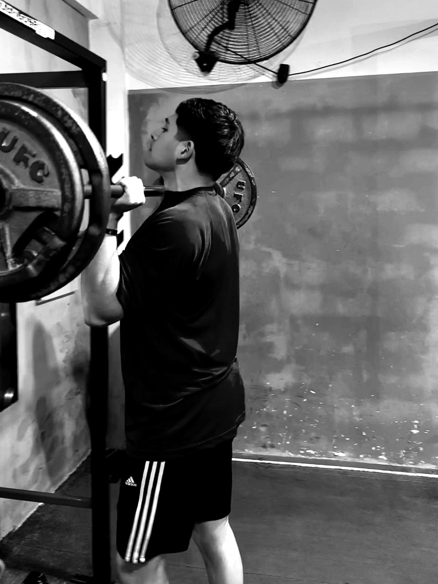 Sentadilla con barra en rack